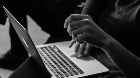 person using laptop